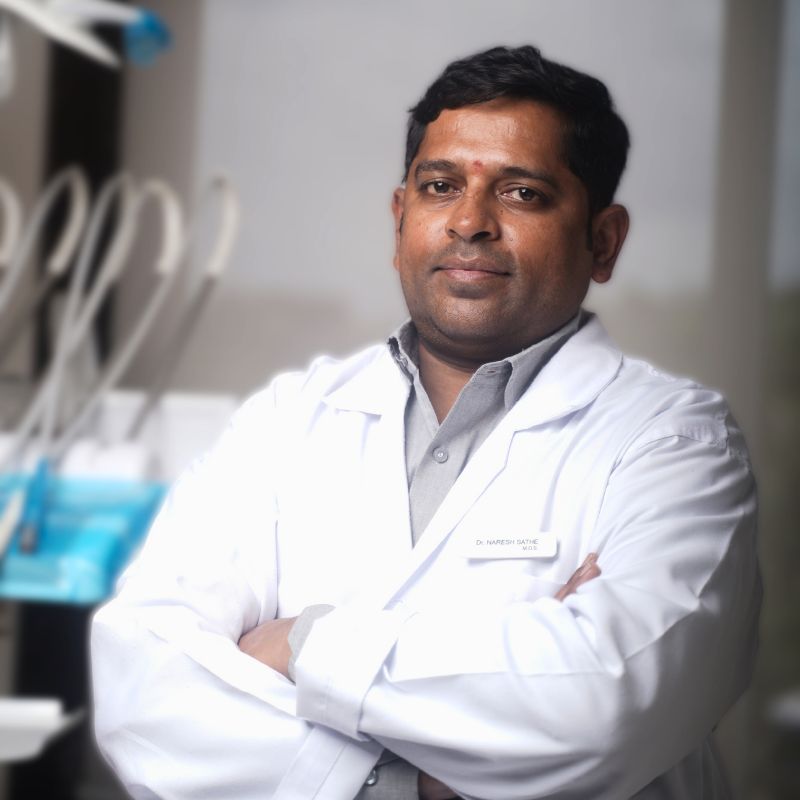 Dr.Naresh-Smiline